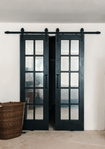 Easy DIY Mirror Barn Doors Using Reclaimed French Doors