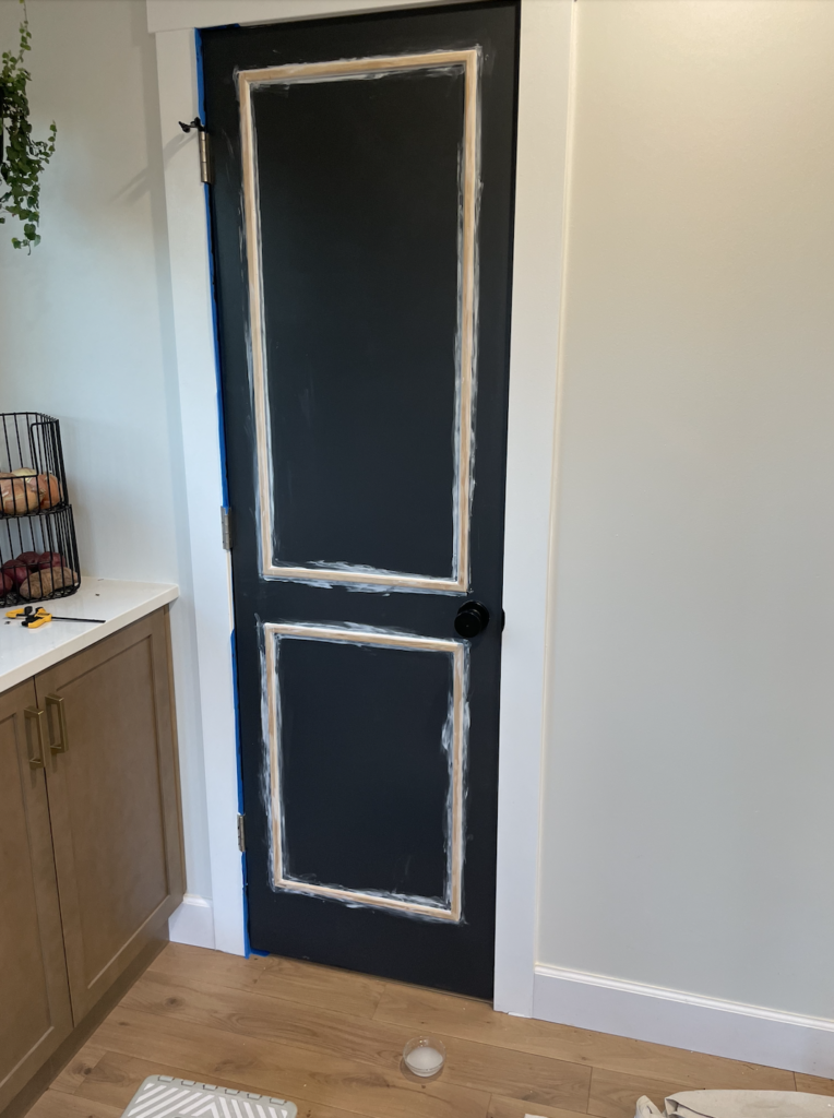 black door with door trim and craftsman molding