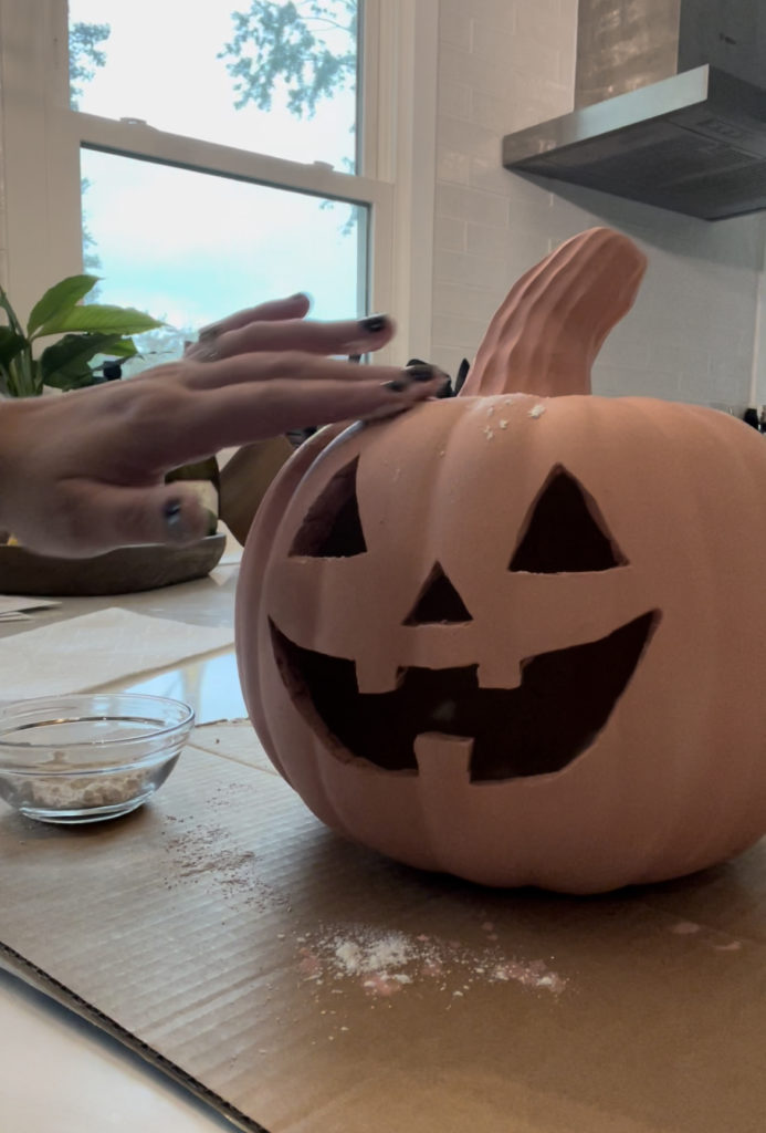 adding flour to the pumpkin